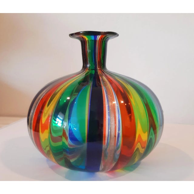 STUNNING! One of a kind beautifully blown art glass with literally every color in the rainbow. Red, Blue, Green, Yellow...