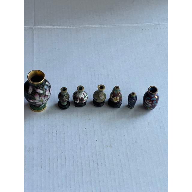 Set of cloisonné vases, 6 are miniature(4 stands) and one bud vase. Use the minis in a doll house or add to your...