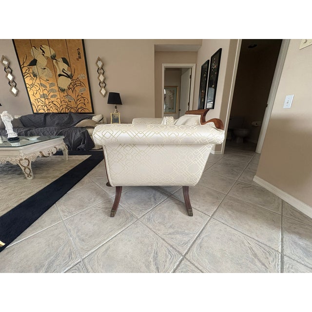 Elegant and sculptural, this Biedermeier-inspired loveseat channels the refined simplicity of early 19th-century European...