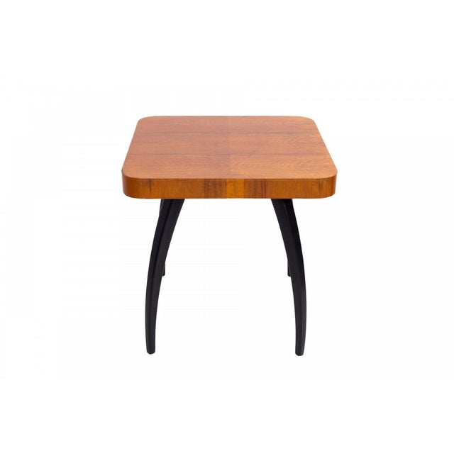 The h-259 "spider" table, designed by jindřich halabala, originated in czechoslovakia in the 1930s. The piece is...