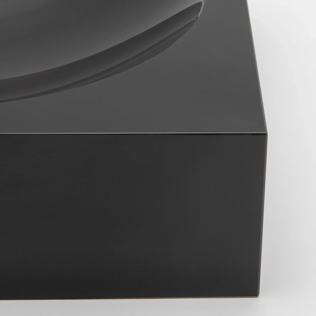 The Crystal Black Convex Bowl by KA Glass is a striking masterpiece of craftsmanship, blending timeless elegance with...