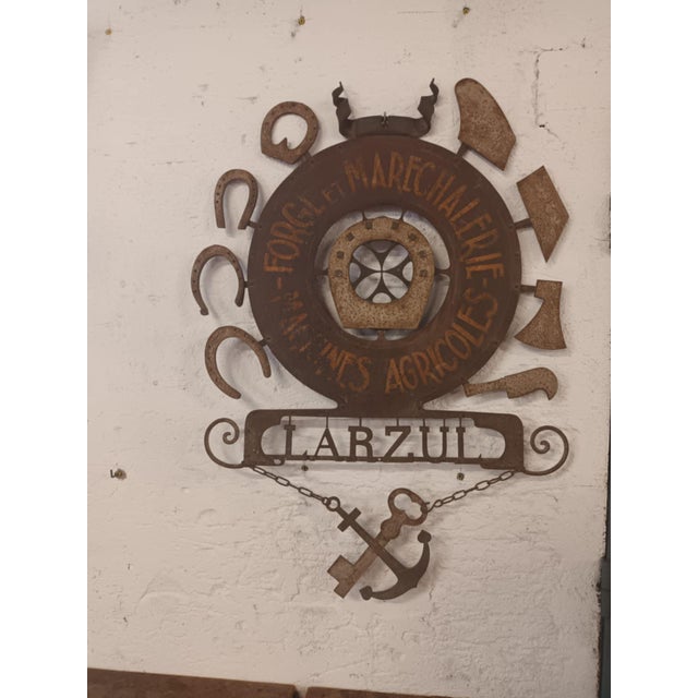 Beautiful, characterful sign for the LARZUL blacksmith and farrier shop, made of riveted, cut sheet metal. Farrier's sign,...