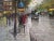 A striking original oil painting on canvas depicting a bustling Parisian boulevard on a rainy afternoon. Executed in an...