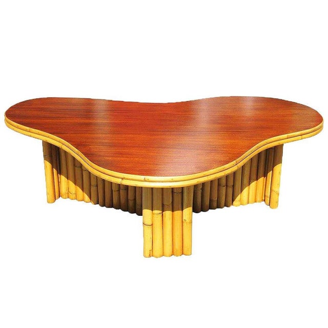 This beautifully restored rattan table blends style and vintage charm with modern comfort. Made in 1950, this biomorphic...