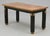 The library table attributed to Otto Schulz, Sweden, circa 1940. Lacquered and painted wood. Measures: L 60" x 29.5" x...