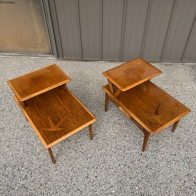 A classic Lane set featuring warm walnut tones, sculptural V-shaped bases, and distinctive starburst rosewood inlay...