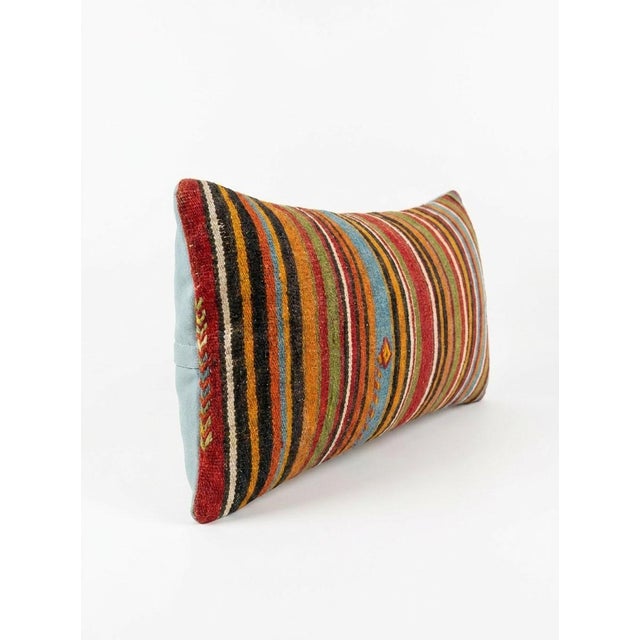 This beautiful 14'' x 36'' hand-woven Kilim pillow cover was made from an authentic Turkish kilim. The traditional flat-...