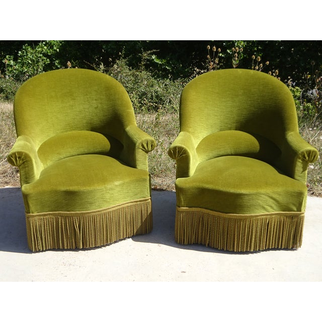 Pair of 1950s tub chairs in very good original condition. Solid wood frame. Green velvet upholstery on all sides. Matching...