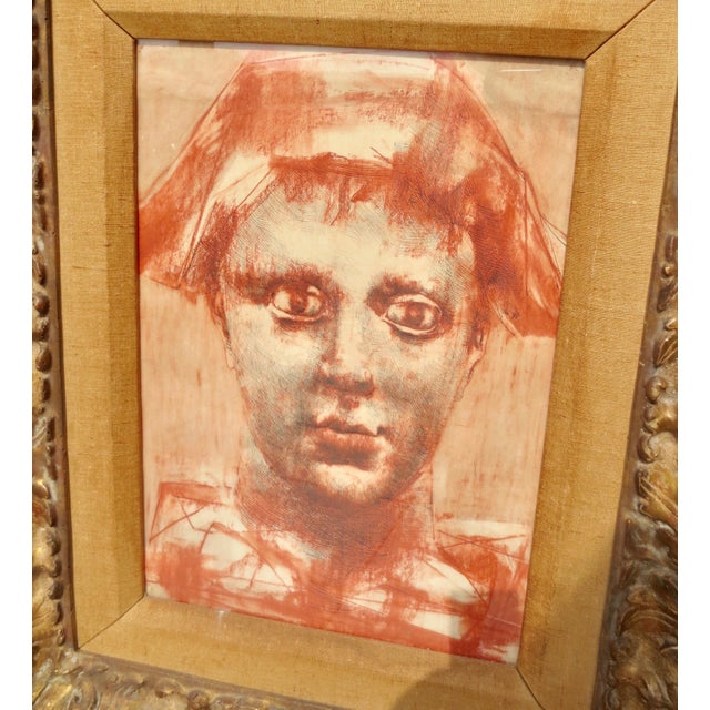 Conte Drawing of Youth. Conte' Crayon and pen and ink drawing. Pen drawing of face, highlighted inked conte crayon and...