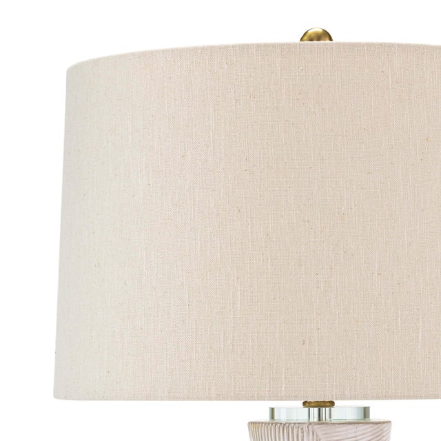 With its alluring silhouette, the Hugo ceramic table lamp brings contemporary appeal and modern contrast to interiors....
