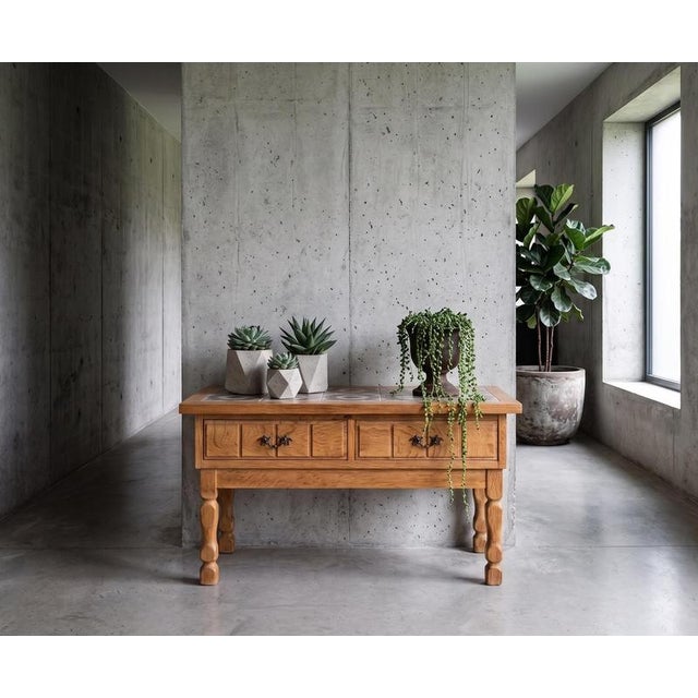 Rectangular hall furniture piece in solid oak attributed to Danish designer Henning Kjærnulf, produced in Denmark during...