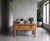 Rectangular hall furniture piece in solid oak attributed to Danish designer Henning Kjærnulf, produced in Denmark during...