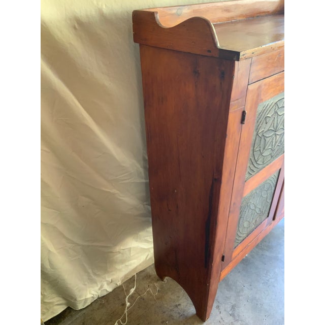 A very nice mid 19th century Pine and Poplar pie safe with the original perforated tins. Old refinish in very good...