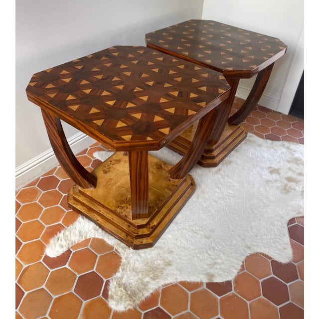 Architecturally striking pair of late 20th-century Italian Art Deco style octagonal side tables. Combining a high-drama,...