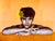 A face looks directly back at the viewer, chin resting on folded arms, a single yellow flower tucked into the hair. There...