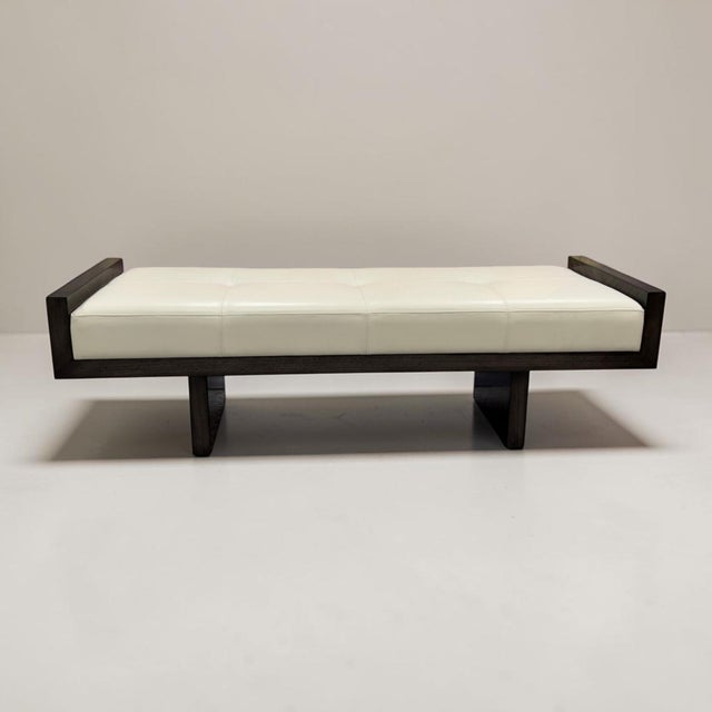 John Richard Virtu Bench in figured eucalyptus with a sophisticated dark finish. The modern bench features a sleek,...