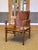 One wonderful natural dark oak wood safari chair, designed by Wilhelm Kienzle / Kare Klint, in 1928 for Wohnbedarf and...