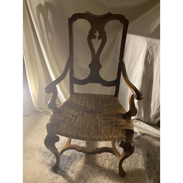 This is a 19th-century Venetian Baroque armchair. The chair features the fluid lines, sinuous curves, and cabriole legs...