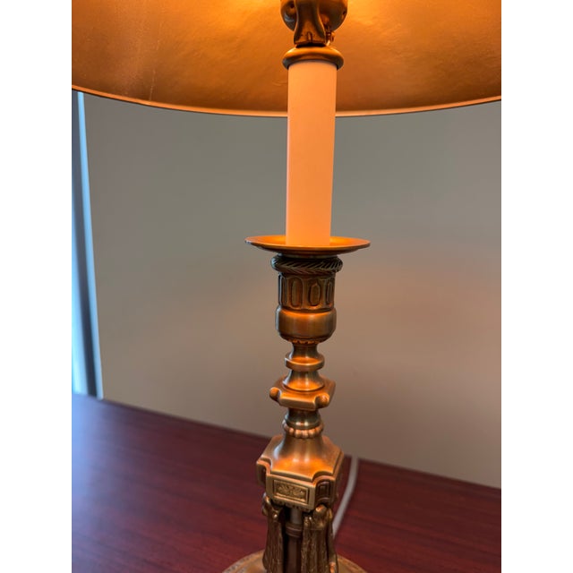 This Neoclassical table lamp is crafted entirely from solid brass and features detailed classical ornamentation throughout...