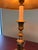 This Neoclassical table lamp is crafted entirely from solid brass and features detailed classical ornamentation throughout...