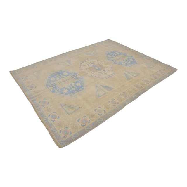 Vintage Anatolian Wool Area Rug, Light Sand Field With Soft Blue Geometric Medallions For Sale