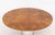 Brueton "Anello" Pedestal Dining Table, rosewood top on stainless steel base, the circular top bookmatched in a four-...