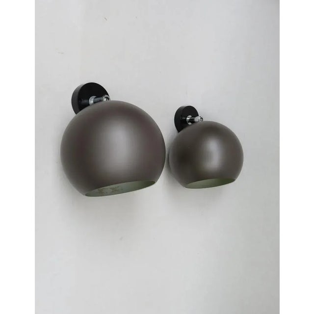 A few ceiling or wall lights in space-aged design from the 1970s, made by erco. The lights are painted in a slightly...