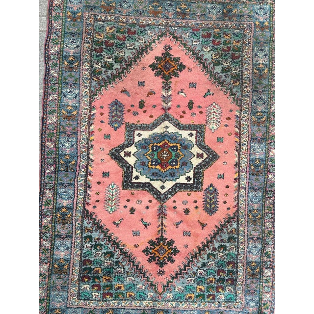 Beautiful midcentury Moroccan rug with a geometrical and tribal design with central medallion and stylized flowers and a...