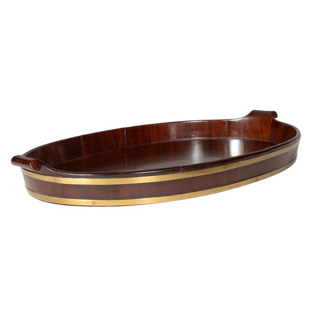 Regency mahogany Brass banded oyster tray. Nice rich mahogany color with shaped handles.