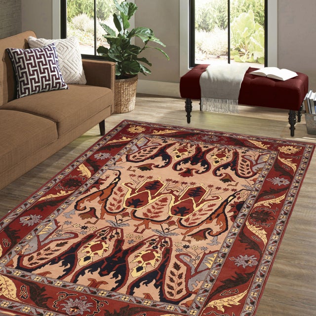 Enhance your home with the timeless craftsmanship of a hand-knotted Kargahi wool rug, celebrated for its tribal artistry,...