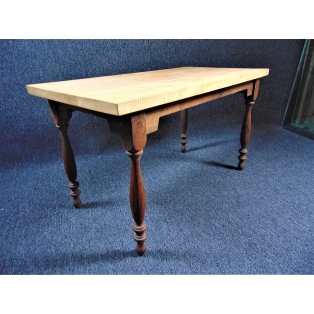 Custom hand made country style farm table , solid tiger maple top , walnut base , turned legs