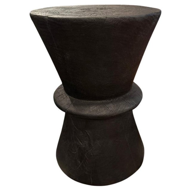 Beautiful minimalist hand carved reclaimed suar wood side table. Charred, sanded and sealed revealing the unique wood...