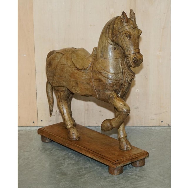 We are delighted to offer for sale this very decorative pair of circa 1880 English hand carved wooden horses. A good...