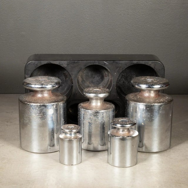 ABOUT An original set of solid steel, chromed calibrating weights. Stamped Toledo on each. Two 10 lb, one 5 lb, one 2 lb...