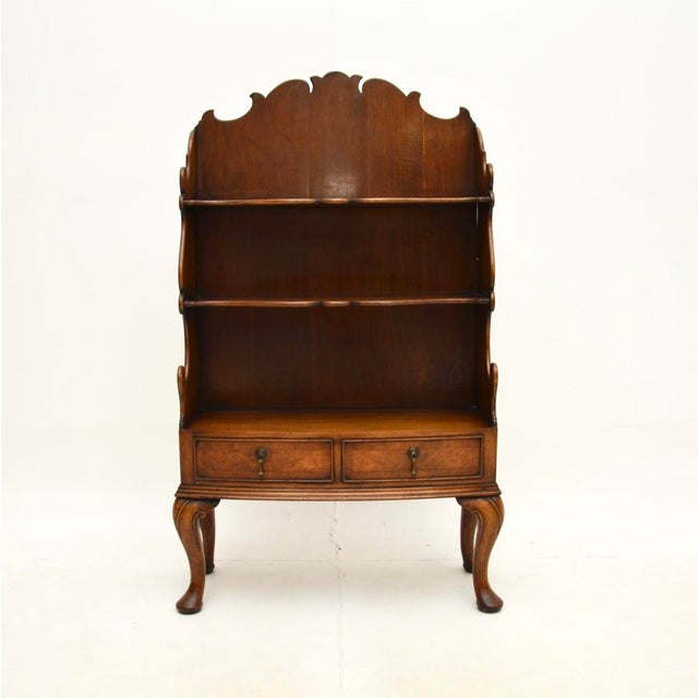 A beautiful and very well made antique burr walnut cascading open bookcase. This was made in England, it dates from around...