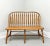 A handcrafted Windsor bench in the Rockford style by Amish craftsmen. Solid oak, bowback, cattail spindles, solid seat,...