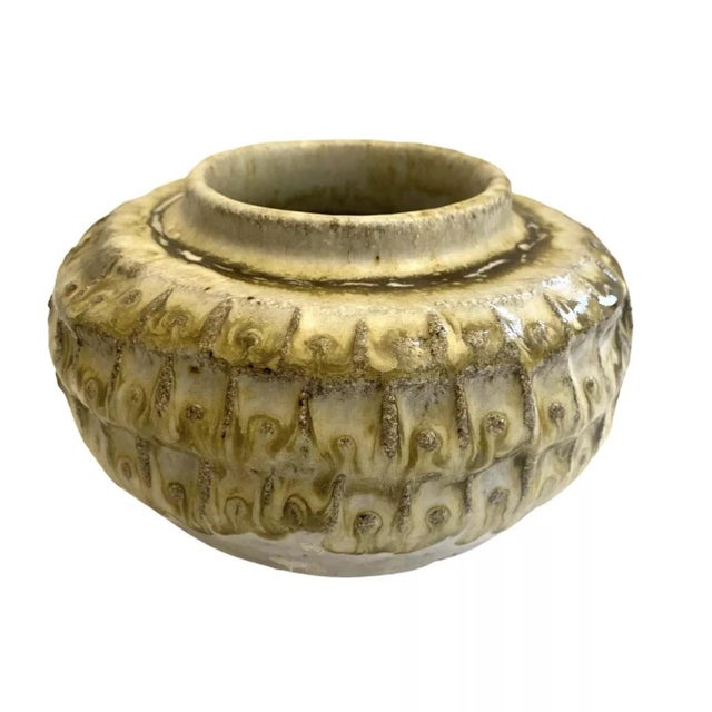 we have for your consideration a very beautiful mid century modern studio art pottery. this piece of pottery consists of a...