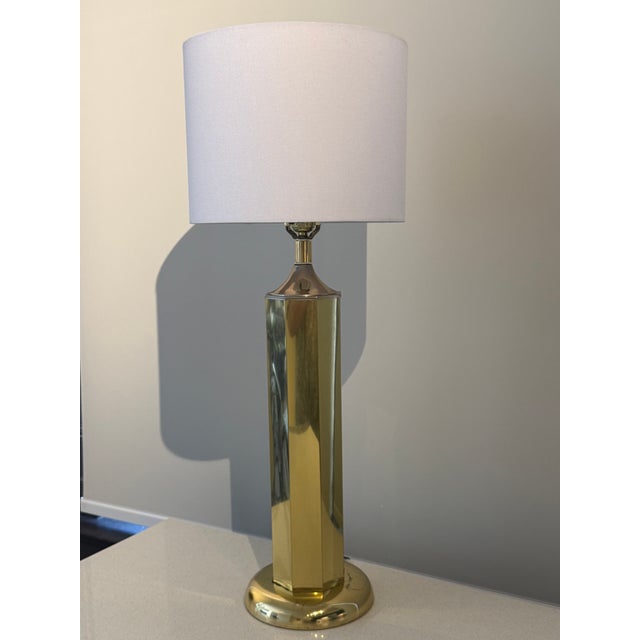 Vintage table lamp by Clover Lamp Company, dating to the 1970s. The lamp features a tall, architectural fasted column in a...