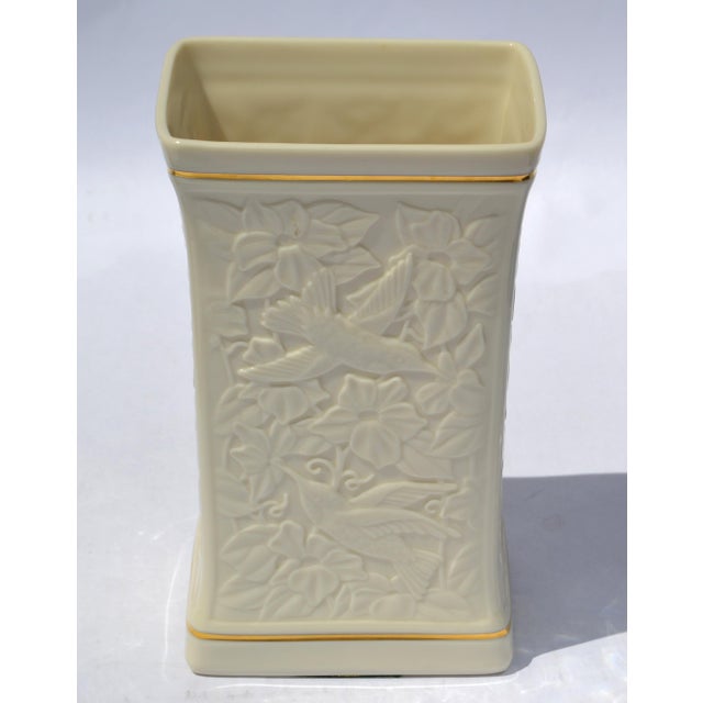 The Lenox Hummingbird Rectangle Vase is a vintage collectible vase crafted from fine bone porcelain, ceramic or china,...