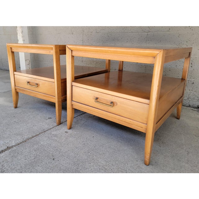 A pair of Drexel end tables each with single drawer. One with travertine top, one with wood top. Quality craftsmanship...