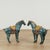 Striking pair of Chinese cloisonne or enamel on brass horses crafted in classic form featuring colorful Symbolic, floral...