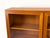 High-quality mid-century display cabinet by Omann Jun from the 1960s. Teak-veneered body with solid teak and glass doors....
