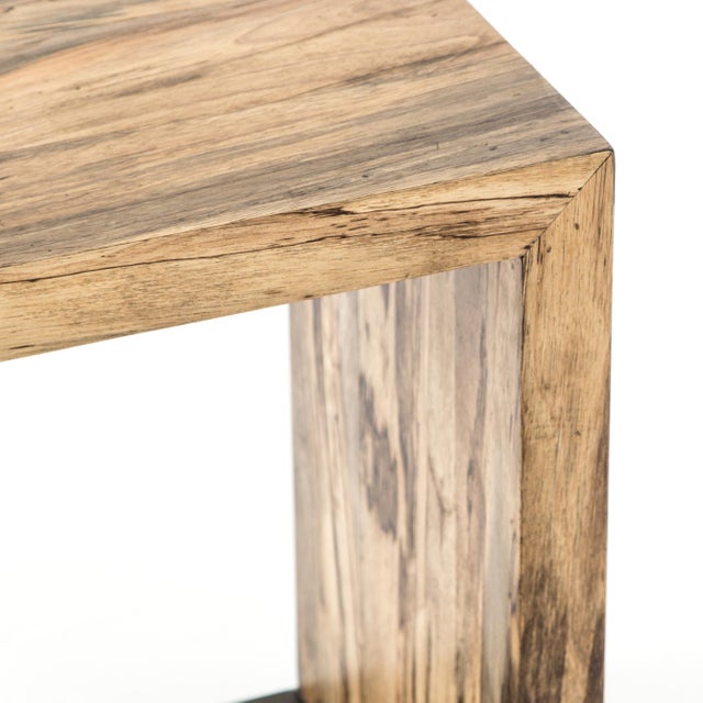 Highs and lows capture movement in this high-impact C-table. Spalted primavera seems to float over a gold-brushed iron...