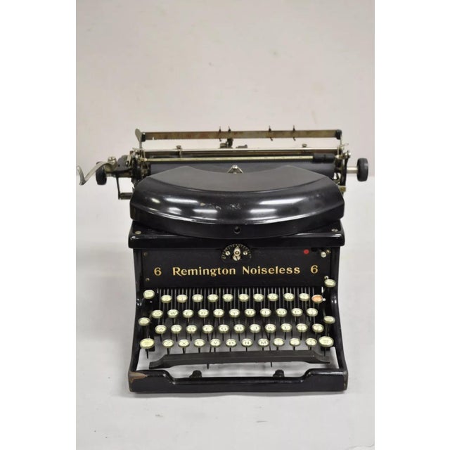 Antique 1930s Remington Noiseless Model 6 Typewriter. Circa Early 20th Century. Measurements: 9" H x 16" W x 15" D....