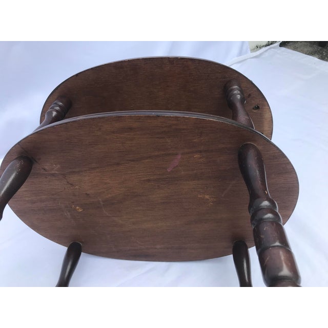 This vintage wooden table is a beautiful piece of furniture that will add character to any room. With three tiers, it...