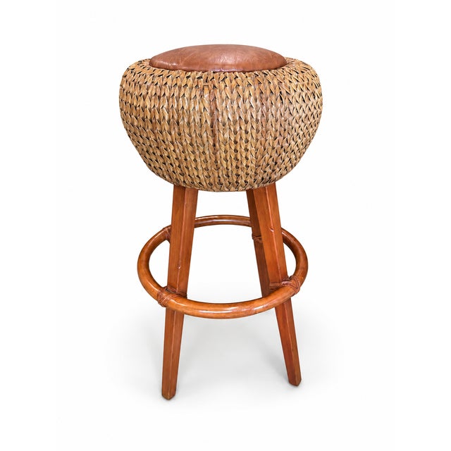 This handsome Palecek stool brings together the brand’s signature natural-material style with a sculptural woven form and...