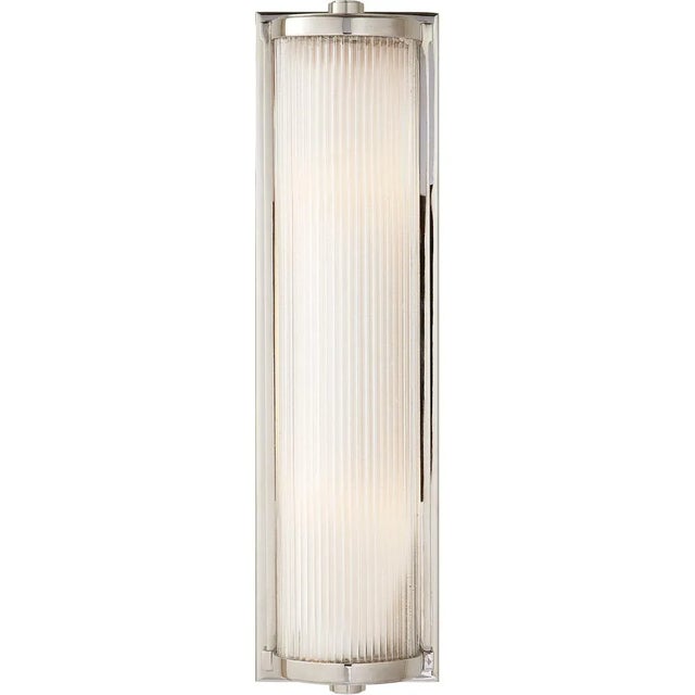 Dresser Long Glass Rod Light in Polished Nickel with Frosted Glass Liner Designer: Thomas O'Brien Height: 18" Extension:...