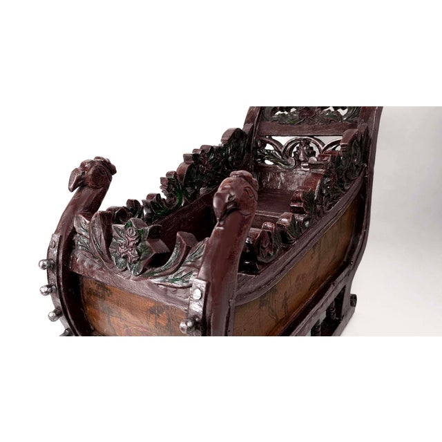 Vintage German Carved Wooden Sleigh with Hand Painted Scenes Thick wooden sleigh features floral motif carving and...
