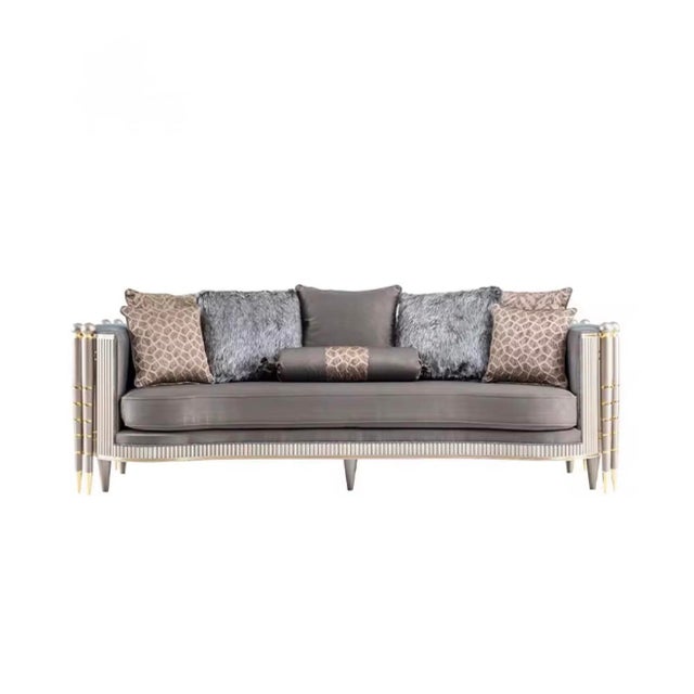 A dramatic statement sofa designed for luxury interiors, boutique lounges, and refined living spaces. This European-...