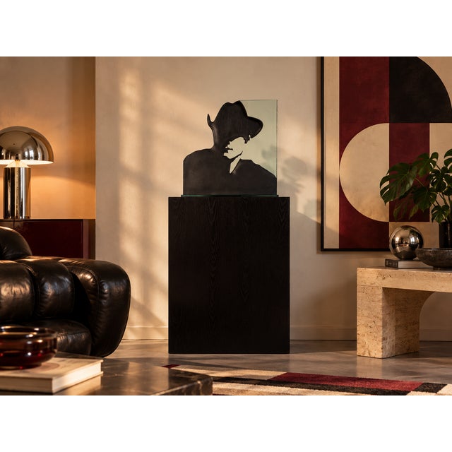 Beautiful vintage art glass sculpture featuring a stylized cowboy silhouette in black and mirrored glass. Signed by the...